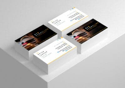 Stack of business cards for Storyline Literary Agency, featuring contact info and website.